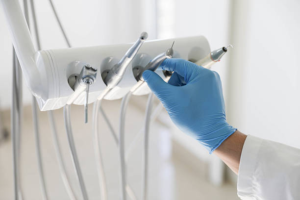 Professional Emergency Dentist technician working in Dania Beach, FL